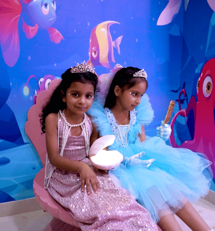 Children dressed as mermaids enjoying an underwater-themed experience at Wooray Patna.